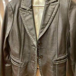Black with white trim leather jacket